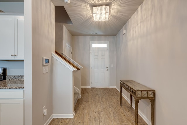 foyer featuring light wood-type flooring