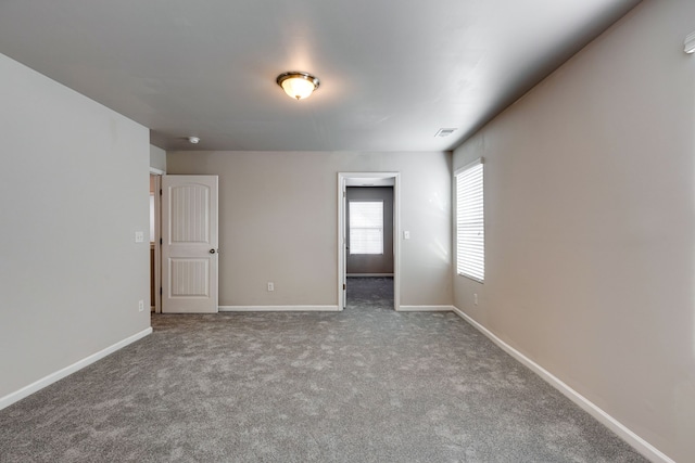 spare room with carpet flooring