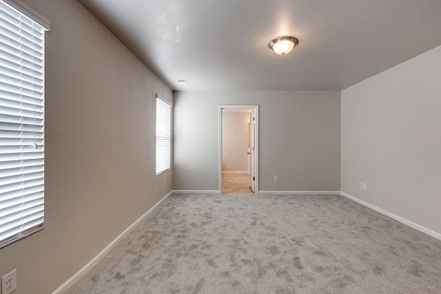 view of carpeted spare room