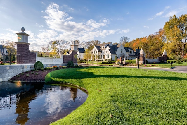 view of home's community featuring a yard