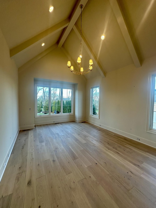 interior space featuring beam ceiling, high vaulted ceiling, a chandelier, and light hardwood / wood-style flooring