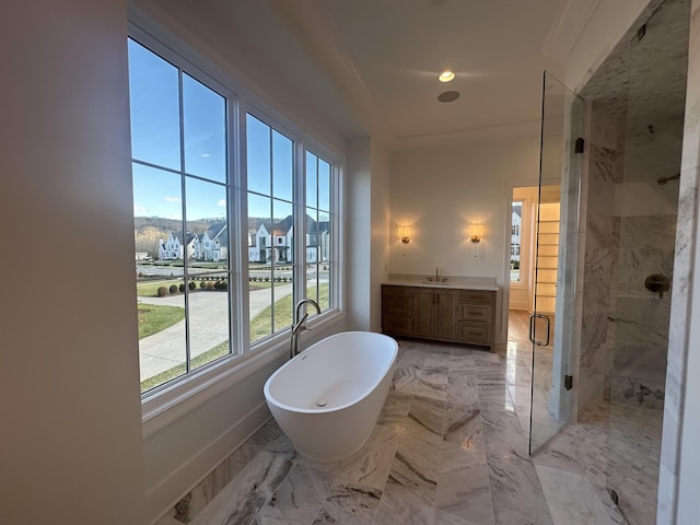 bathroom featuring shower with separate bathtub and vanity