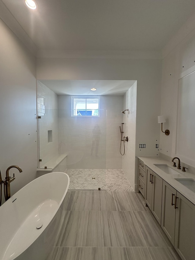 bathroom featuring vanity and plus walk in shower