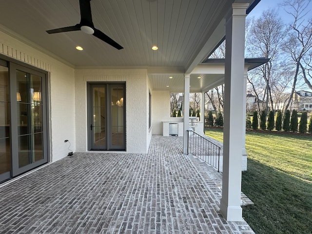 view of patio with exterior kitchen and ceiling fan