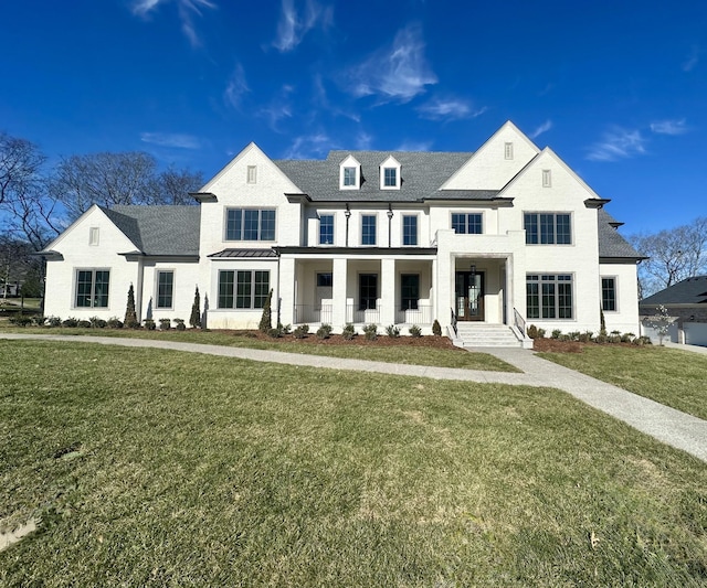 view of front facade with a front yard