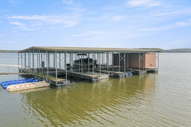 view of dock with a water view