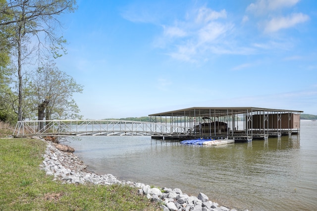 dock area featuring a water view