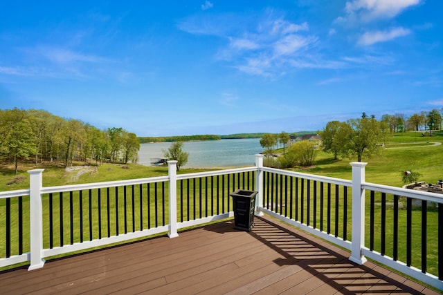 deck featuring a yard and a water view