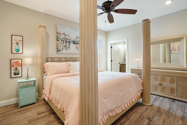 bedroom with ceiling fan and hardwood / wood-style floors