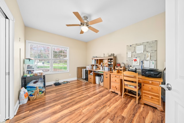 office featuring hardwood / wood-style floors and ceiling fan