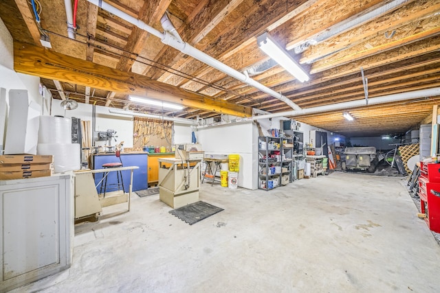 basement with a workshop area