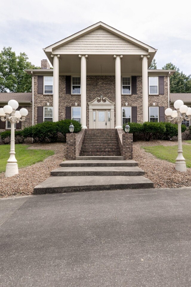 greek revival house with a porch