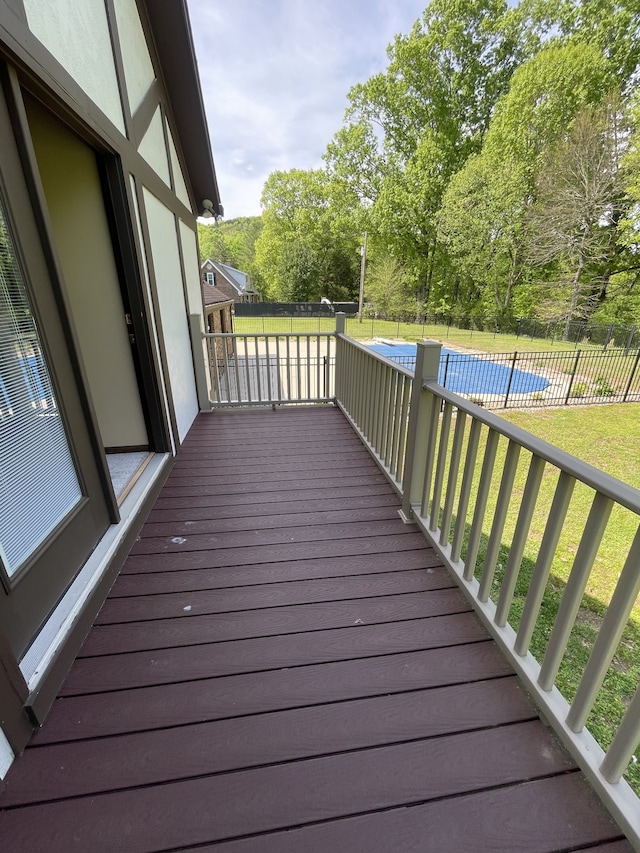 wooden deck with a yard