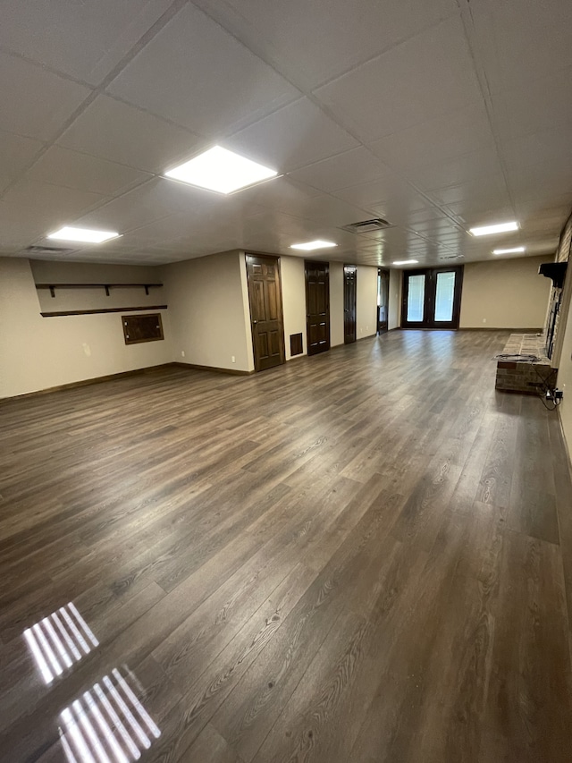 basement with dark wood-type flooring