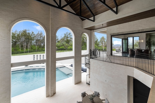 view of swimming pool featuring a patio area