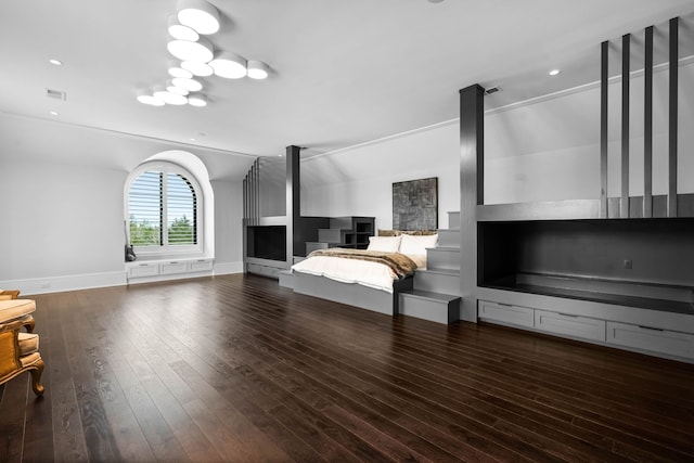 unfurnished living room with dark wood-type flooring