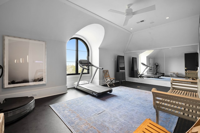 workout room with lofted ceiling and ceiling fan