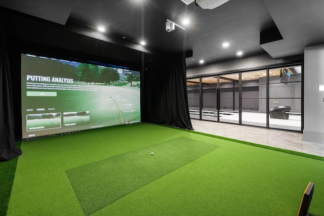 playroom with golf simulator and carpet