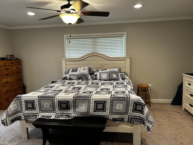 bedroom featuring a ceiling fan, light carpet, crown molding, and baseboards