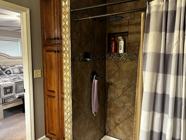 full bath featuring a tile shower and connected bathroom