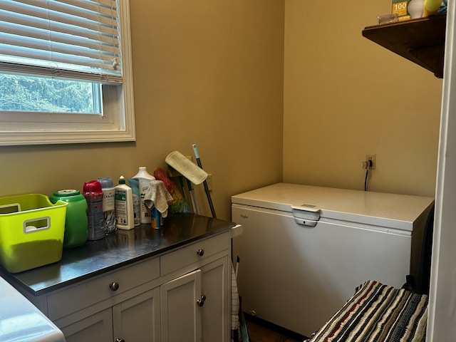 laundry room with cabinet space