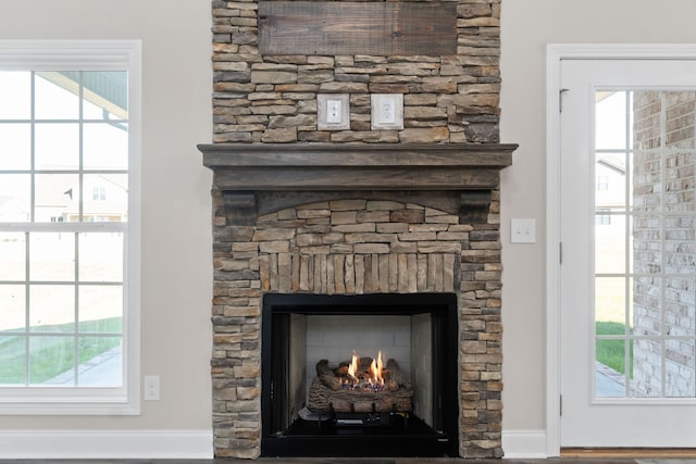 details featuring a stone fireplace