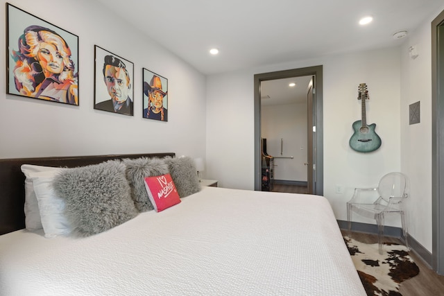 bedroom featuring dark wood-type flooring