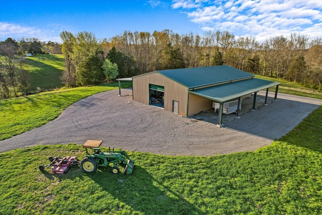 exterior space with a yard and an outdoor structure