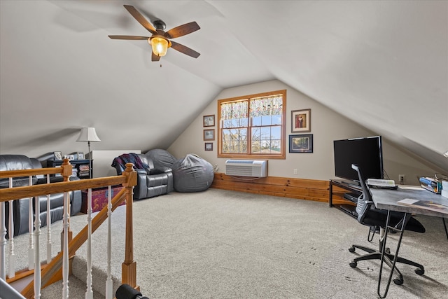 carpeted home office with ceiling fan and lofted ceiling