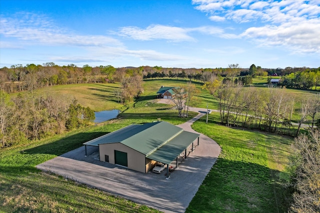 birds eye view of property with a rural view