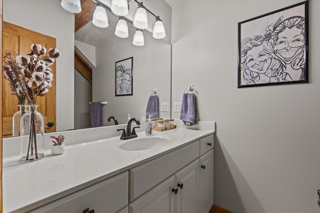 bathroom with vanity with extensive cabinet space