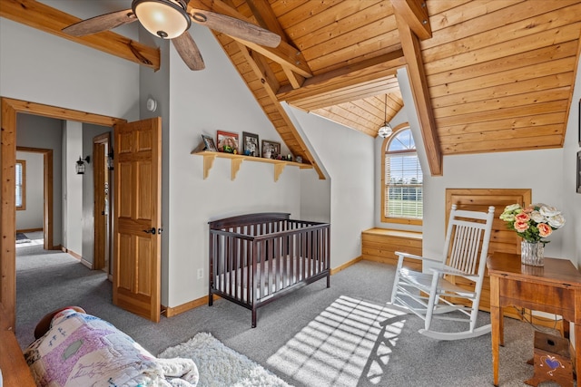 bedroom with wood ceiling, ceiling fan, carpet floors, and lofted ceiling with beams