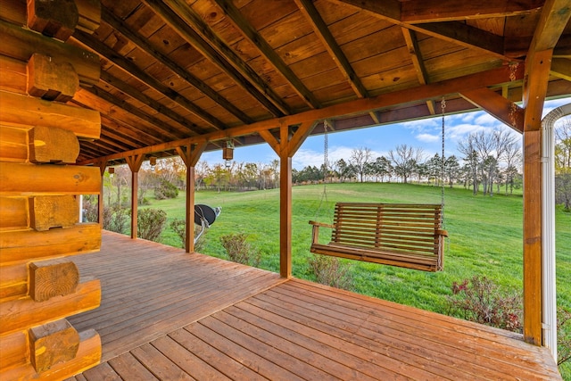 deck featuring a lawn