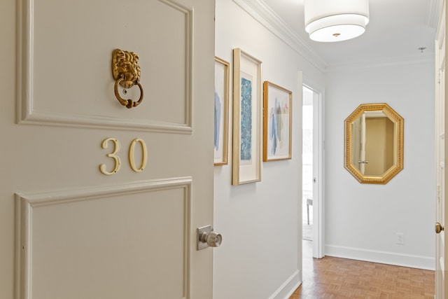 hallway featuring ornamental molding and light parquet floors