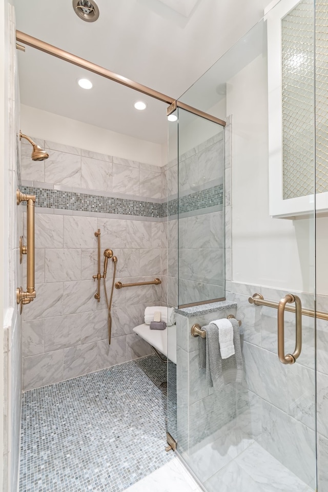 bathroom featuring tile flooring and an enclosed shower