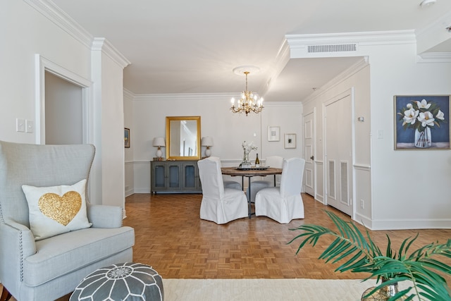 dining room with crown molding, an inviting chandelier, and parquet floors