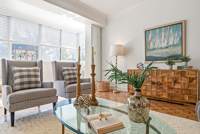 living area featuring parquet floors and ornamental molding