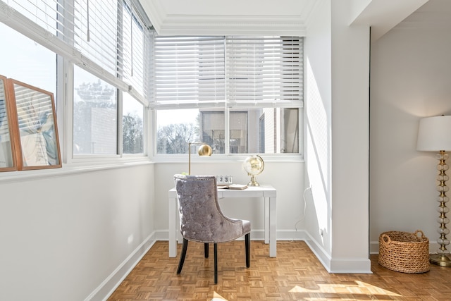 sitting room featuring light parquet flooring and ornamental molding