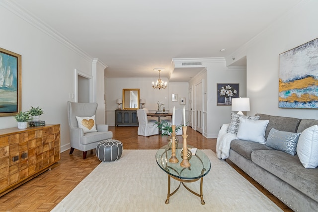 living room with parquet flooring, a notable chandelier, and ornamental molding