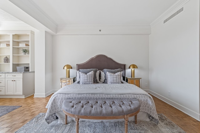 bedroom featuring ornamental molding and light parquet flooring