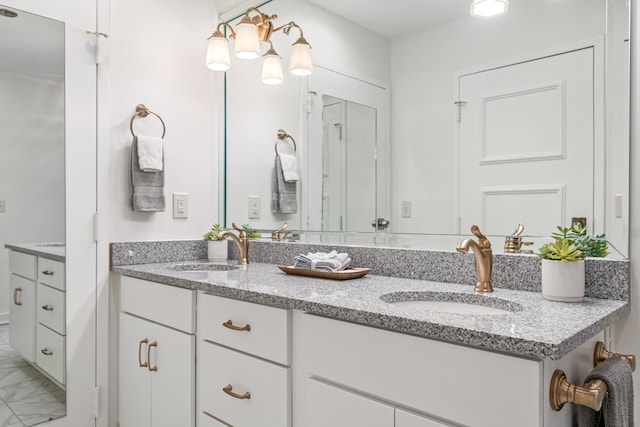 bathroom featuring tile flooring and double sink vanity