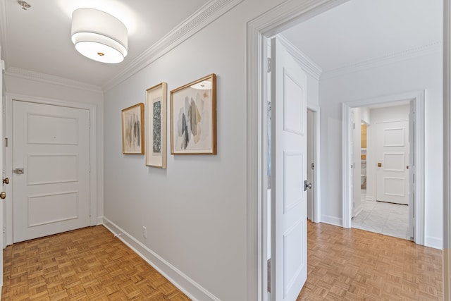 corridor featuring ornamental molding and light parquet floors