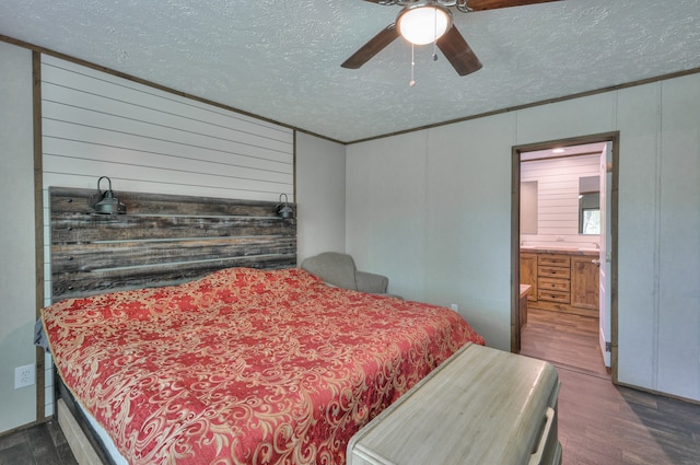 5077 Southpoint Ridge Rd, Hampshire, TN 38461 - bedroom with a textured ceiling, ceiling fan, wood walls, and dark wood-type flooring