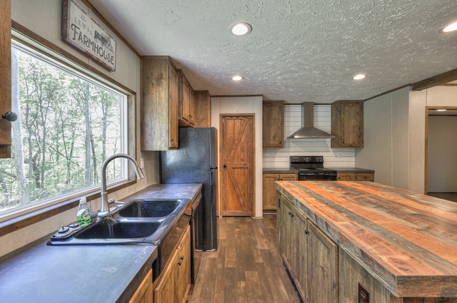 5077 Southpoint Ridge Rd, Hampshire, TN 38461 - kitchen featuring wall chimney exhaust hood, wood counters, dark wood-type flooring, black appliances, and backsplash