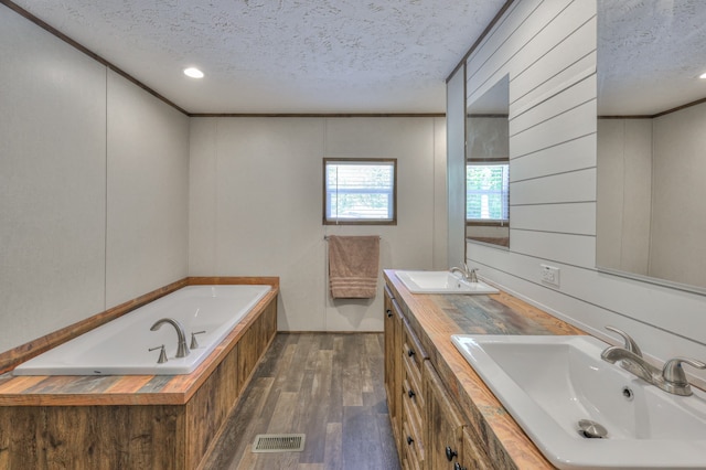 5077 Southpoint Ridge Rd, Hampshire, TN 38461 - bathroom featuring a textured ceiling, wood walls, and hardwood / wood-style flooring