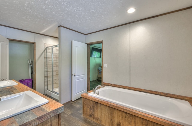 5077 Southpoint Ridge Rd, Hampshire, TN 38461 - bathroom with plus walk in shower, vanity, and a textured ceiling