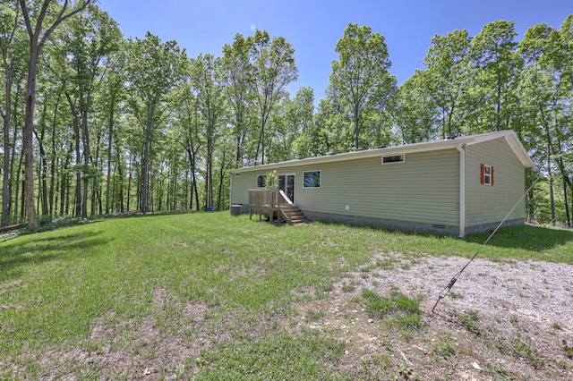 5077 Southpoint Ridge Rd, Hampshire, TN 38461 - back of house featuring a lawn