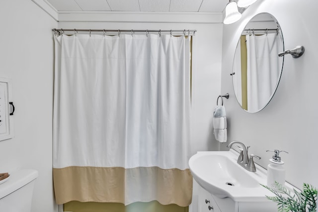 bathroom with vanity and toilet