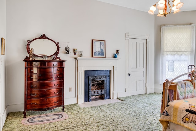 bedroom with carpet and an inviting chandelier