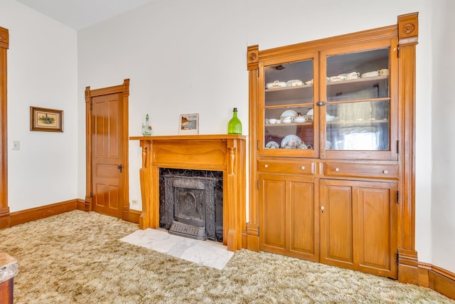 unfurnished living room with carpet floors